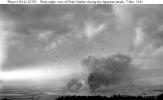 Photograph of the harbor during the attack.  This is what MSgt Omahen witnessed.  Click on picture for larger image.